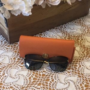 Tory Burch sunglasses.